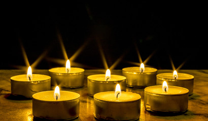 Tea candle, burning, solemn, star