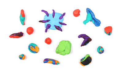 Set of colorful plasticine shapes isolated on white background
