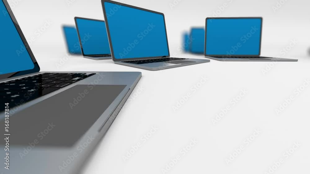 Poster stack of laptops. loopable. depth of field.