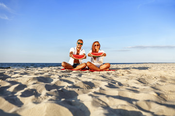 lovers on beach and water melon 