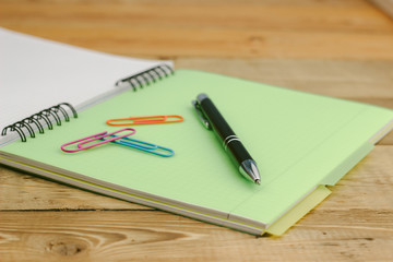 notebook and pen isolated on the white