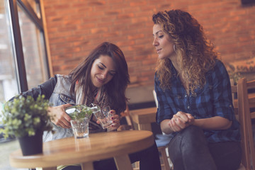 Pouring a glass of mint leaves detox water