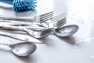 concept of washing dishes on white background