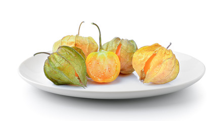 Physalis fruit in  plate isolated on a white background