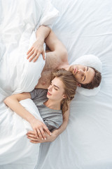 Obraz na płótnie Canvas couple sleeping in bed