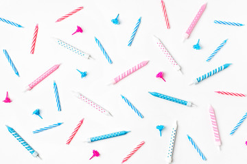 Pattern made of birthday party pink and blue candles. Holiday concept