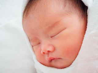 Newborn baby girl sleeping