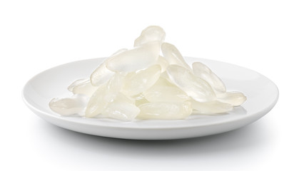 Palm Seed in a plate isolated on a white background