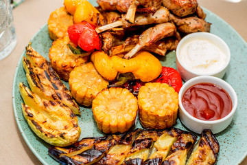 Grilled lamb ribs with vegetables