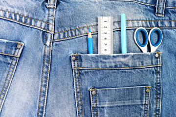 Engineers tools in jeans pocket, close up