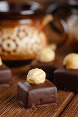 Handmade chocolate bonbons with hazelnut