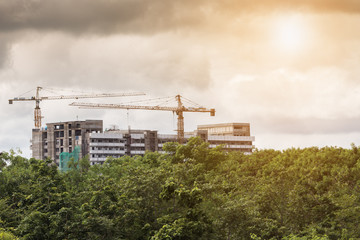 Obraz premium industrial building use tower crane in construction site