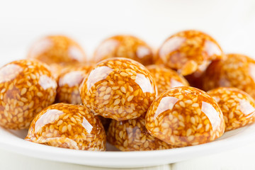 Handmade sesame candy in sugar caramel