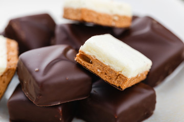 Homemade chocolate candies with vanilla and chocolate soufle. Bird's milk