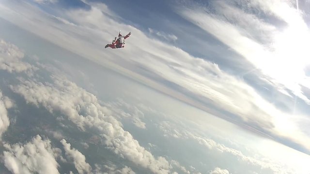Skydiver santa claus jump out of plane