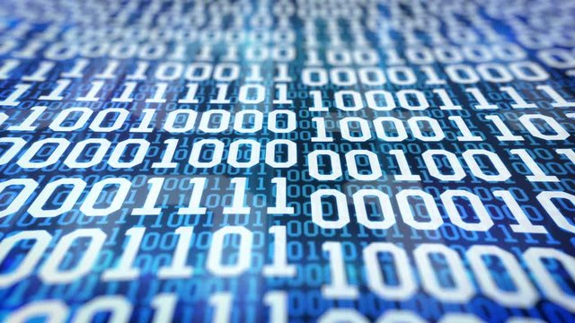 Closeup of binary code on blue background. Depth of field.