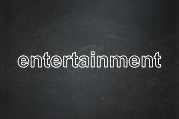 Holiday concept: Entertainment on chalkboard background