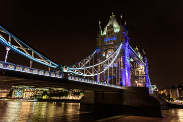 Tower Bridge at night over the River Thames, London, UK, England