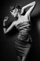 elegant fashionable woman in blue dress