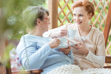Pensioner drinking tea