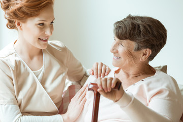 Elder holding walking stick