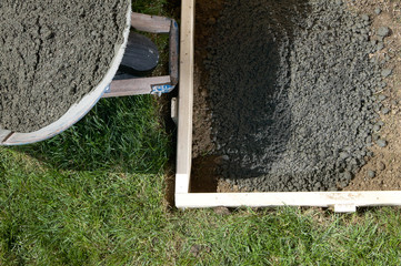 DIY home concrete project closeup with wet cement