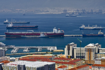 an aerial view of Gibraltar, its marina and the Mediterranean sea as seen from the Rock of Gibraltar