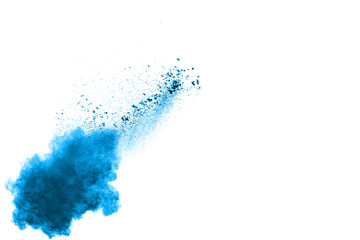 Blue color powder explosion on white background.
