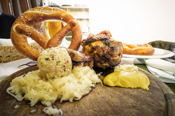 south tyrol food pork shank canederli kraut sausage