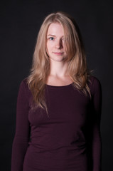 Fototapeta premium Studio portrait of young blonde woman - natural pure skin, no make up