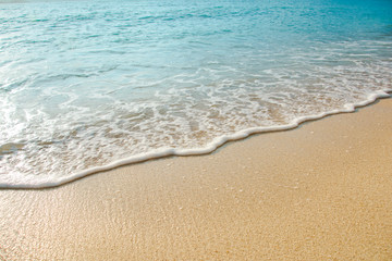 Fototapeta na wymiar beautiful wave of ocean on the beach