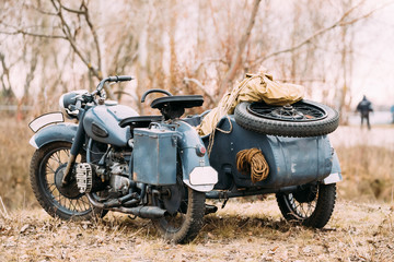 Obraz premium Rarity Three-Wheeled Motorcycle With Sidecar Of German Forces Of
