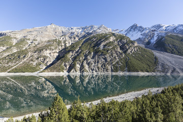 Lago di Livigno, Mountain lake in the border area of Swiss and Italian alps