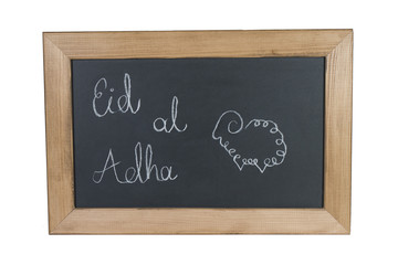 Sheep Drawing on Black Board for Feast of Sacrifice and written "Eid al Adha" on it