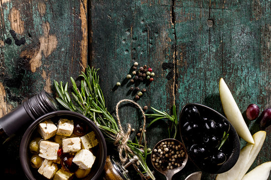 Tasty Italian Greek Mediterranean Food Ingredients Top View on Green Old Rustic Table Above