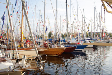Boats standing in harbor.