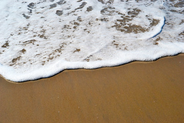 Pattern of a wave in the sand