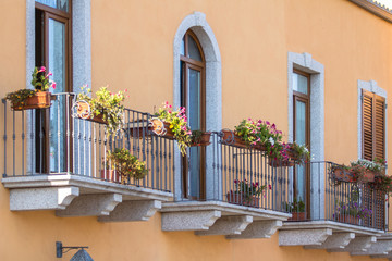 Fototapeta na wymiar Balcony with iron railing in classic style