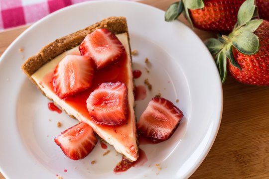 Cheesecake Slice With Fresh Strawberries From Above