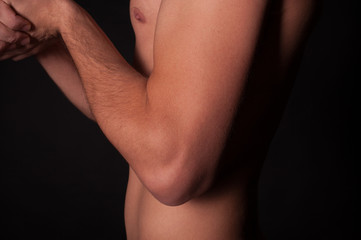 Fototapeta na wymiar Man's arm - clean skin, body part, power and health