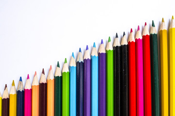 Close up of color pencils on white background