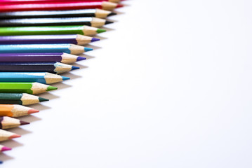Close up of color pencils on white background