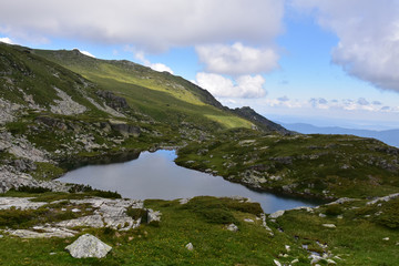 Naklejka na ściany i meble One of the three Malyoviski lakes situated in the skirts of Malyovitsa Peak, Rila Mountains, Bulgaria