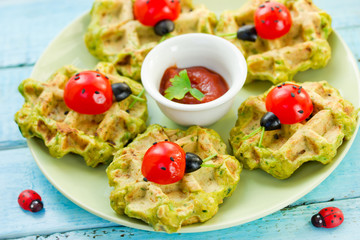 Cherry tomatoes ladybugs on spinach waffles