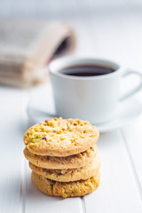 Sweet pistachio cookies and coffee mug.