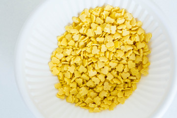 Yellow ornament for cakes and desserts
