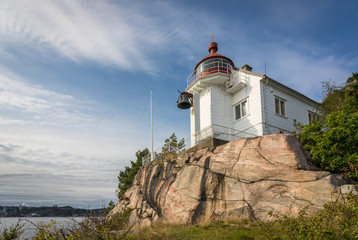 Fototapeta na wymiar Lighthouse at Odderoya in Kristiansand, Norway