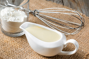 Bechamel white sauce in gravy boat