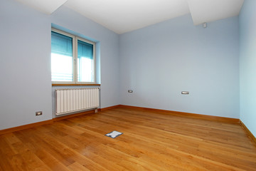 New empty room with light blue walls