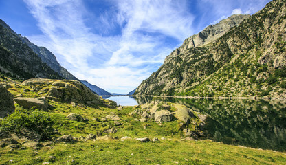 Fototapeta na wymiar Mountains and lake photo with reflection